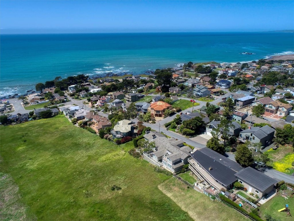 404 Huntington Road Cambria, CA 93428 - Photo 65 of 72 an aerial view of residential building with outdoor space