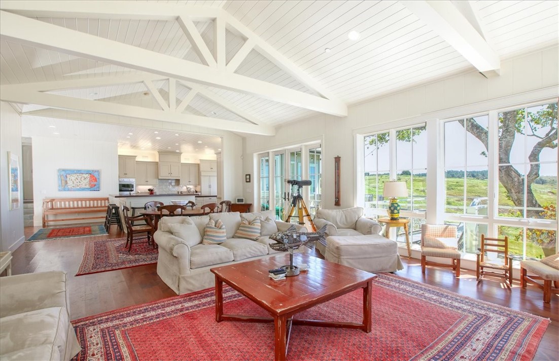 404 Huntington Road Cambria, CA 93428 - Photo 10 of 72 a living room with furniture and a large window