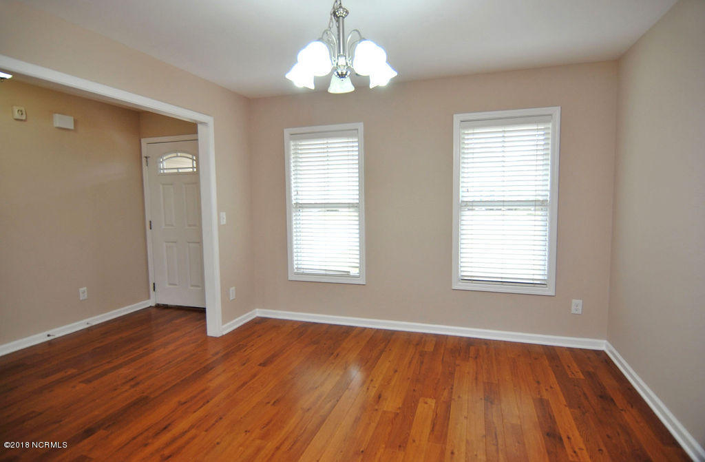 1257 South Brook Road Winnabow, NC 28479 - Photo 3 of 24 Formal Dining Room - Laminate Floors