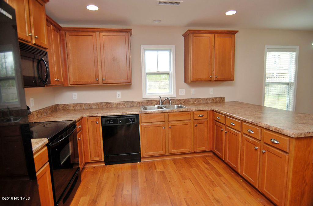 1257 South Brook Road Winnabow, NC 28479 - Photo 4 of 24 Kitchen - Laminate Floors
