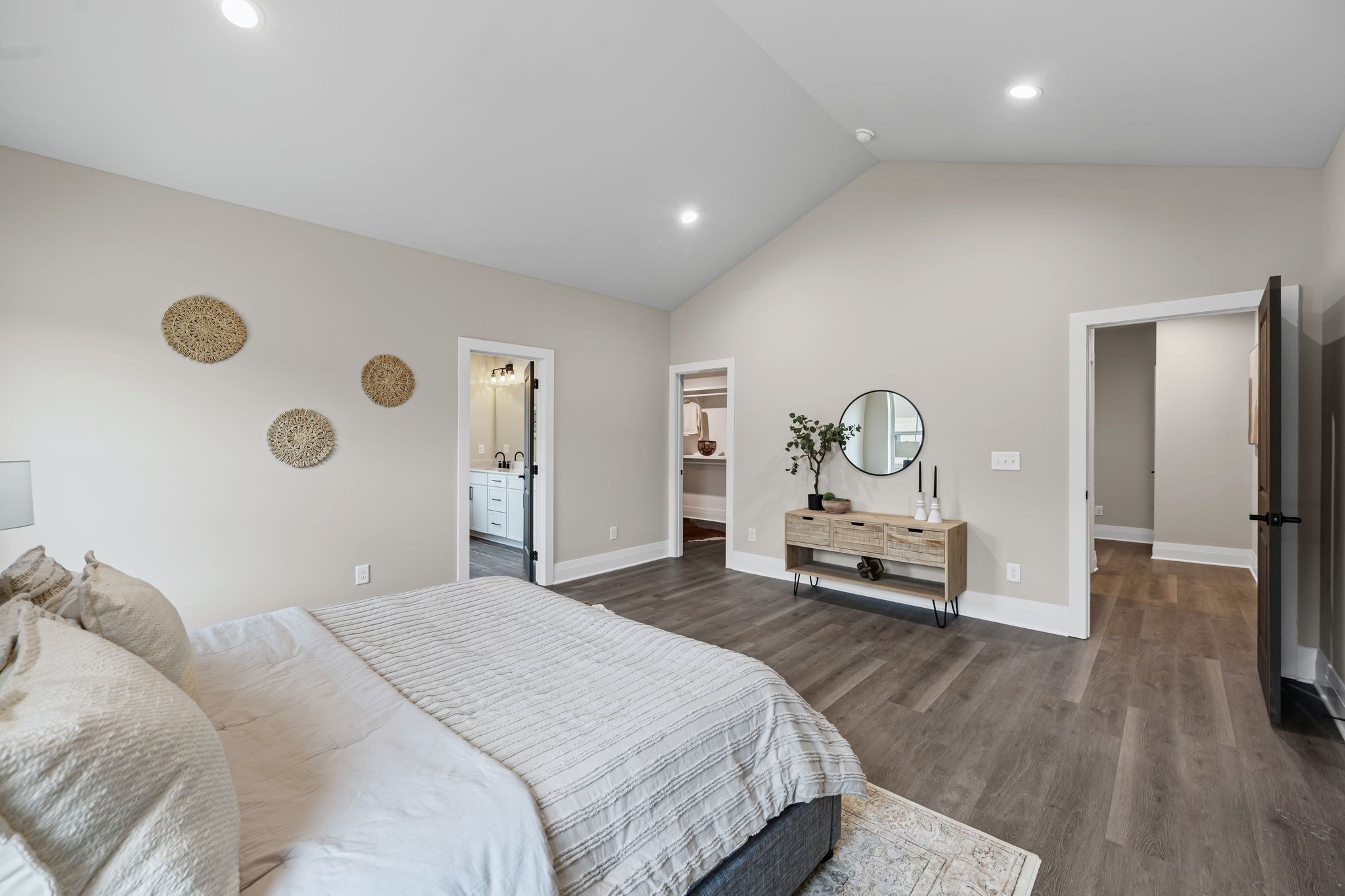 1036 Noble Loop, Unit 34 Nashville, TN 37211 - Photo 15 of 34 a bedroom with a bed and wooden floor