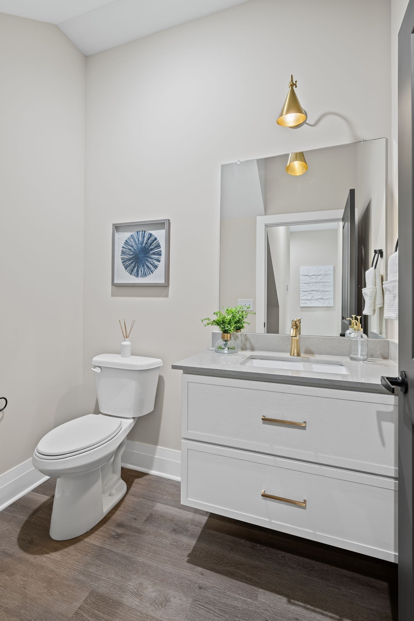 1036 Noble Loop, Unit 34 Nashville, TN 37211 - Photo 8 of 34 a bathroom with a toilet a sink and mirror
