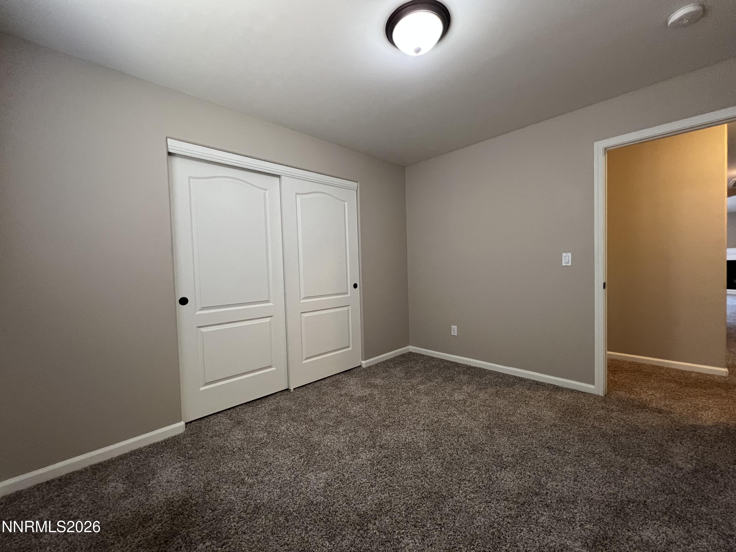 18406 Teddy Bear Court Reno, NV 89508 - Photo 24 of 44 an empty room with closet area