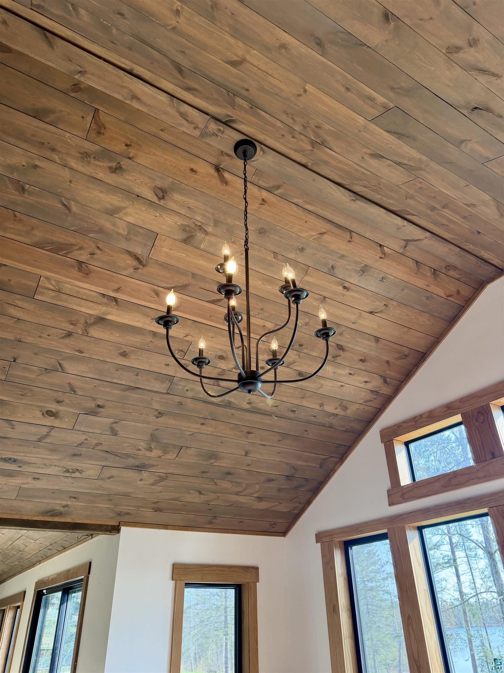 5274 Marble Lake Road Two Harbors, MN 55616 - Photo 6 of 79 Vaulted wood-finish ceiling featuring a multi-arm chandelier