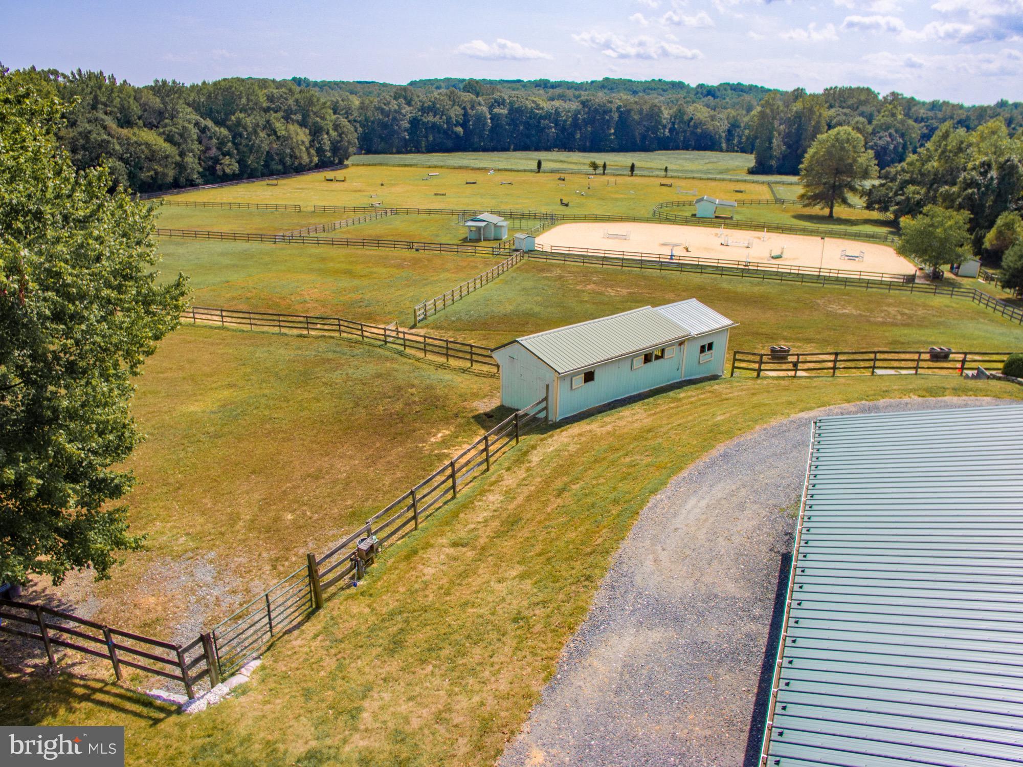 6089 Fishers Station Road Lothian, MD 20711 - Photo 58 of 75 Pastures and run in shed