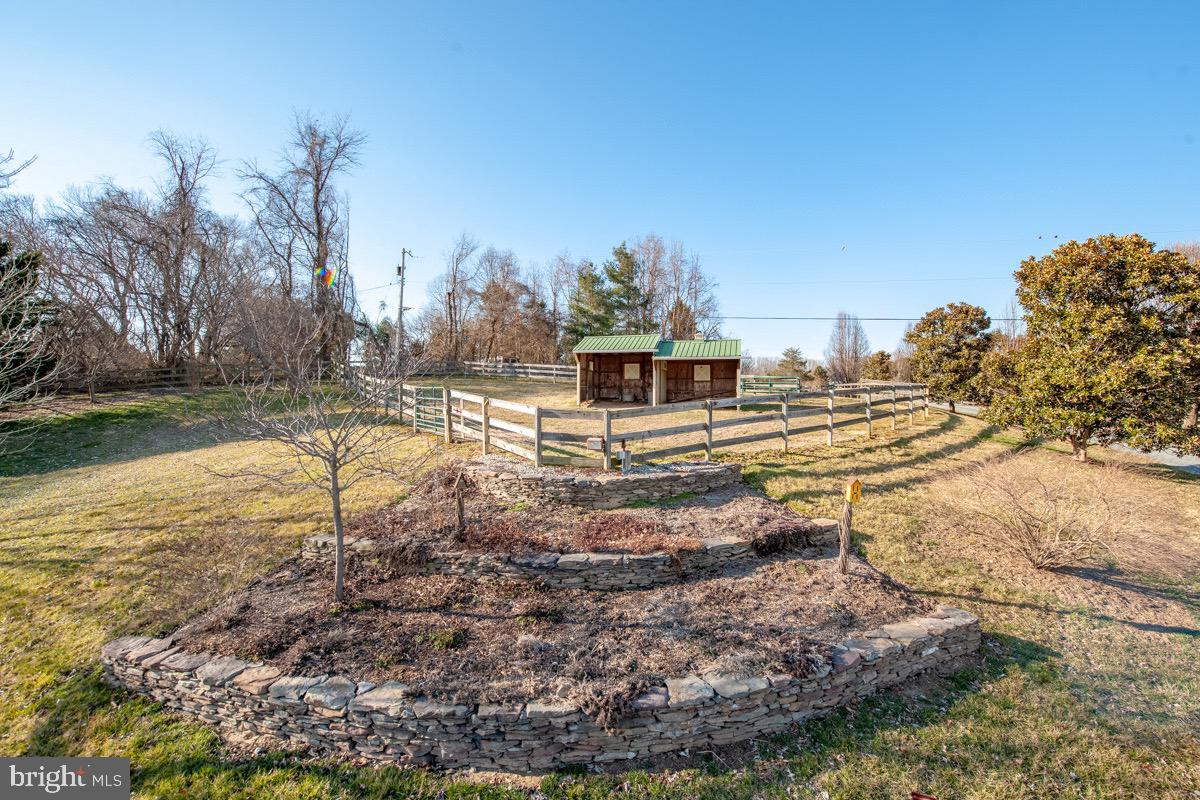 6089 Fishers Station Road Lothian, MD 20711 - Photo 7 of 75 Yard landscaping and paddock w run in shed