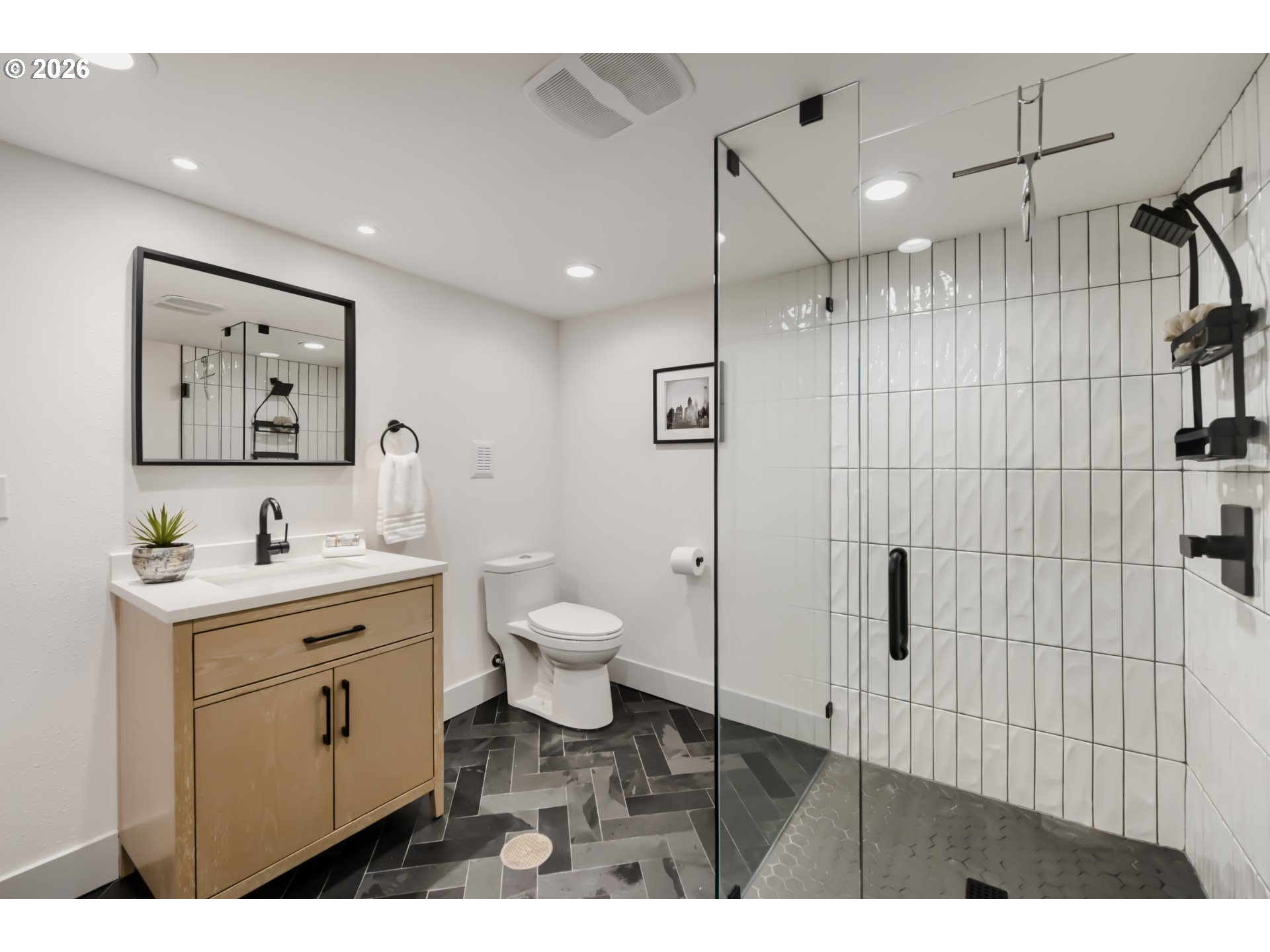 2833 Northwest Cumberland Road Portland, OR 97210 - Photo 23 of 28 a bathroom with a toilet sink and shower