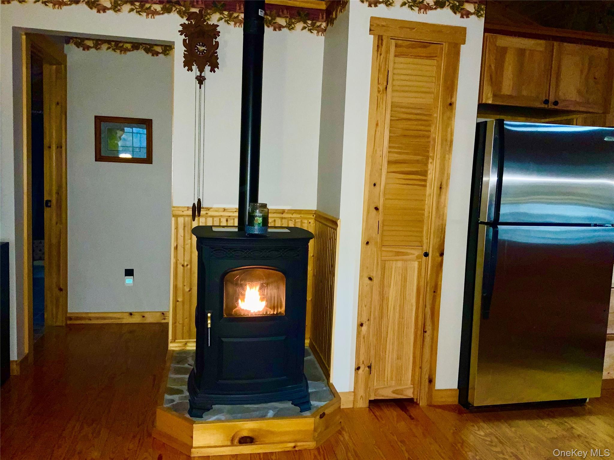 66 Milton Smith Road Long Eddy, NY 12760 - Photo 10 of 25 The cozy pellet stove adds warmth and charm to the home's open living space.