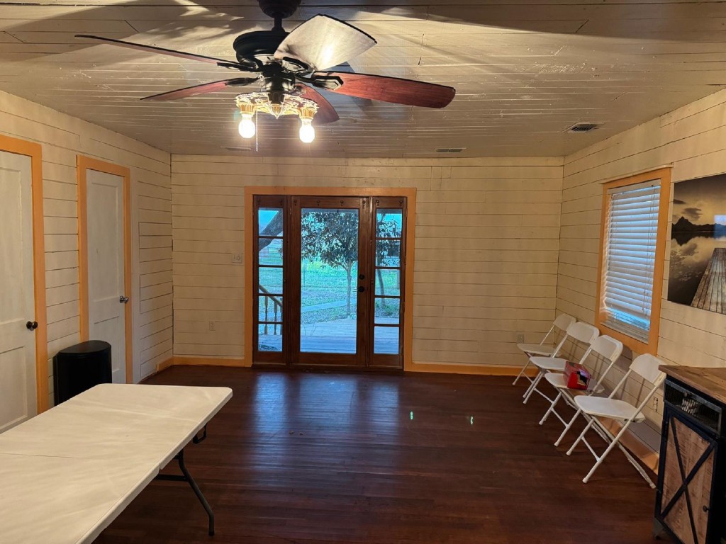 5644 Pitts Road Katy, TX 77493 - Photo 13 of 31 a room with furniture and wooden floor