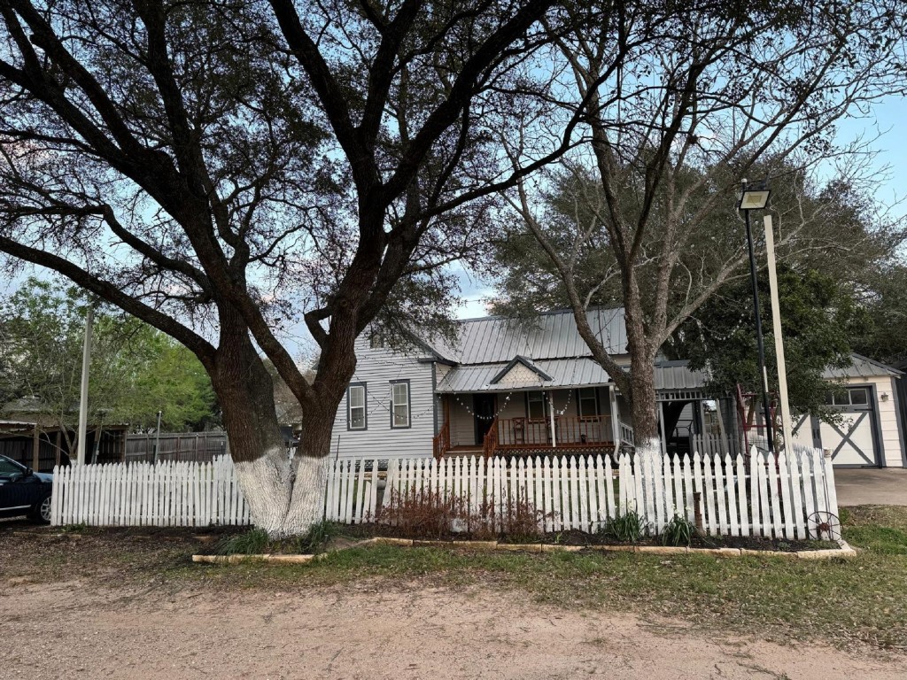 5644 Pitts Road Katy, TX 77493 - Photo 2 of 31 a front view of a house with a garden