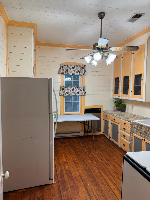 5644 Pitts Road Katy, TX 77493 - Photo 22 of 31 a kitchen with stainless steel appliances granite countertop a sink a stove and a wooden floors
