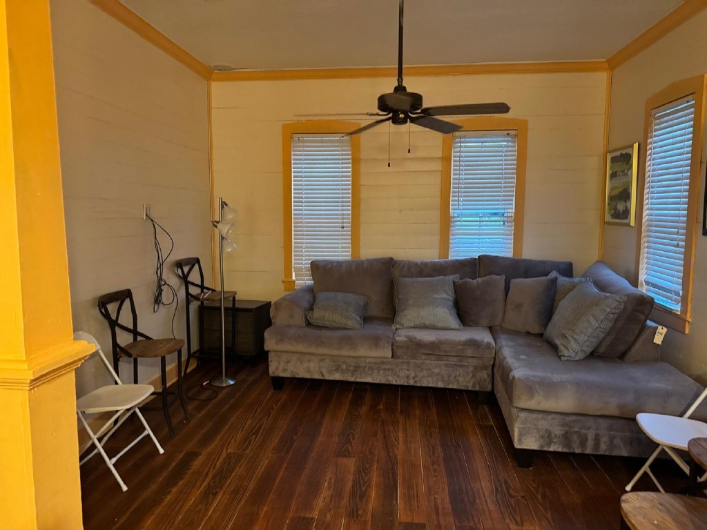 5644 Pitts Road Katy, TX 77493 - Photo 26 of 31 a living room with furniture and a wooden floor