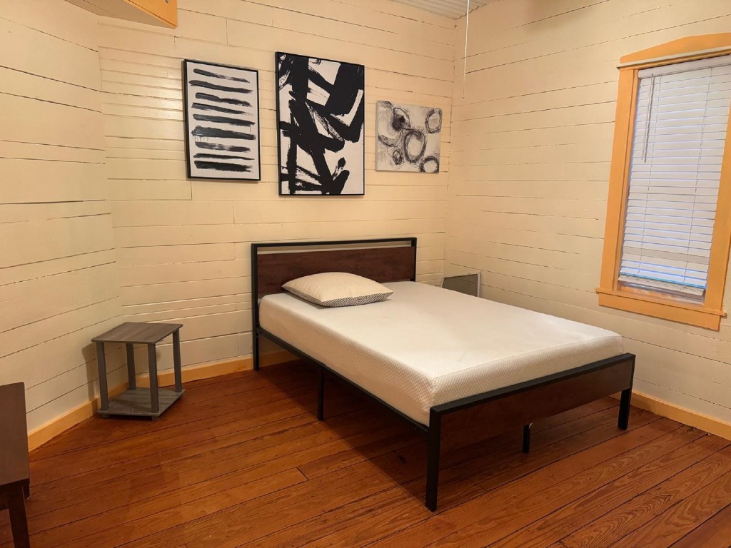 5644 Pitts Road Katy, TX 77493 - Photo 27 of 31 a bedroom with a bed and wall painting