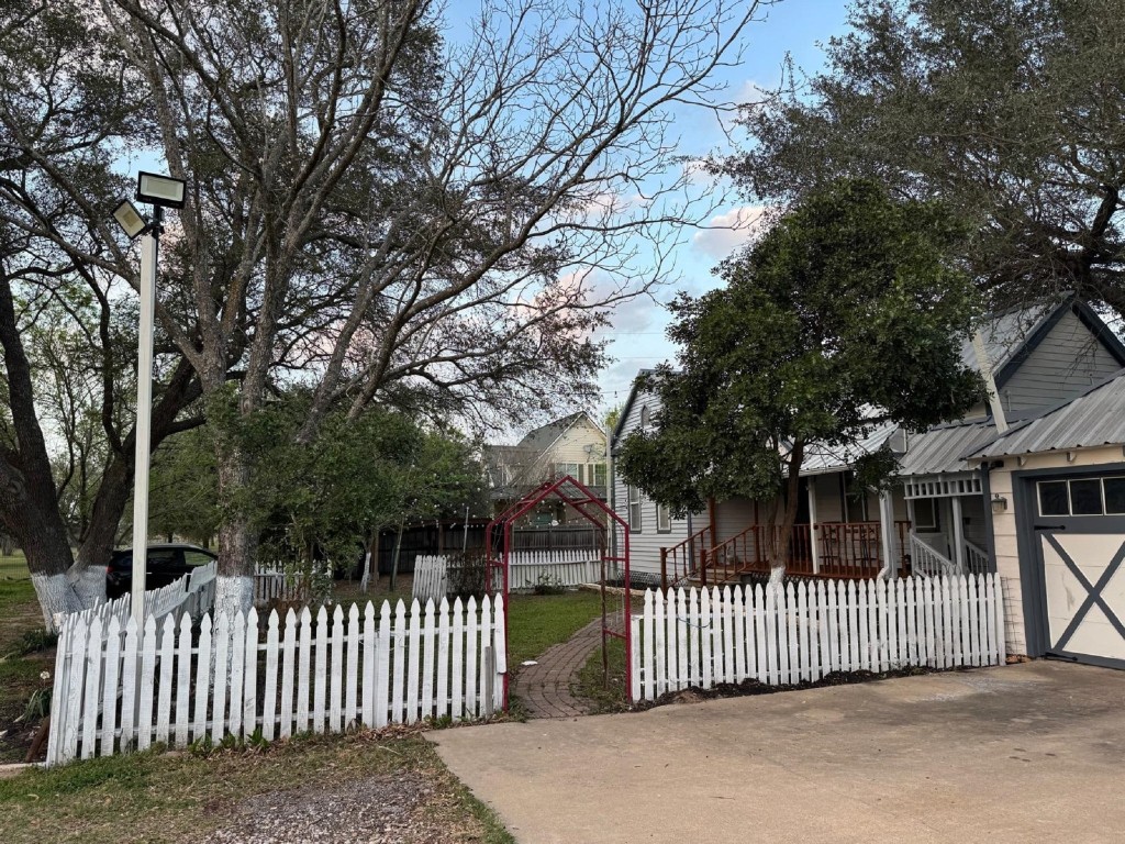 5644 Pitts Road Katy, TX 77493 - Photo 10 of 31 a front view of a house with iron fence