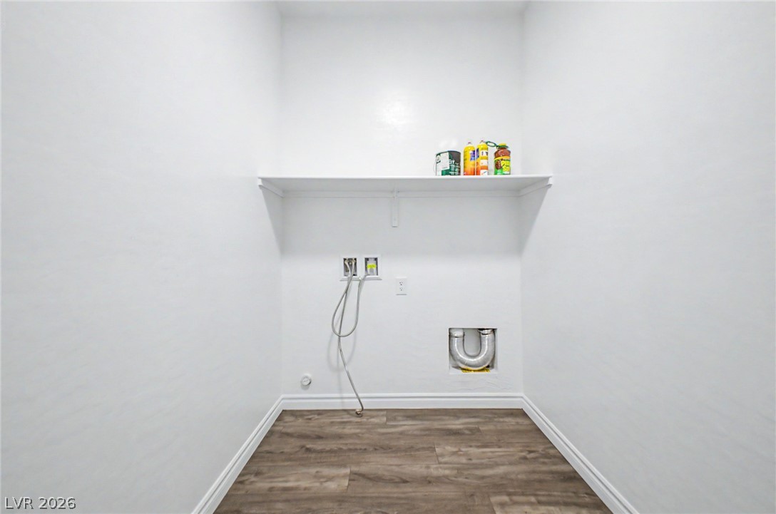 226 Augusta Ridge Henderson, NV 89015 - Photo 29 of 47 Functional laundry space with convenient connections and overhead storage.