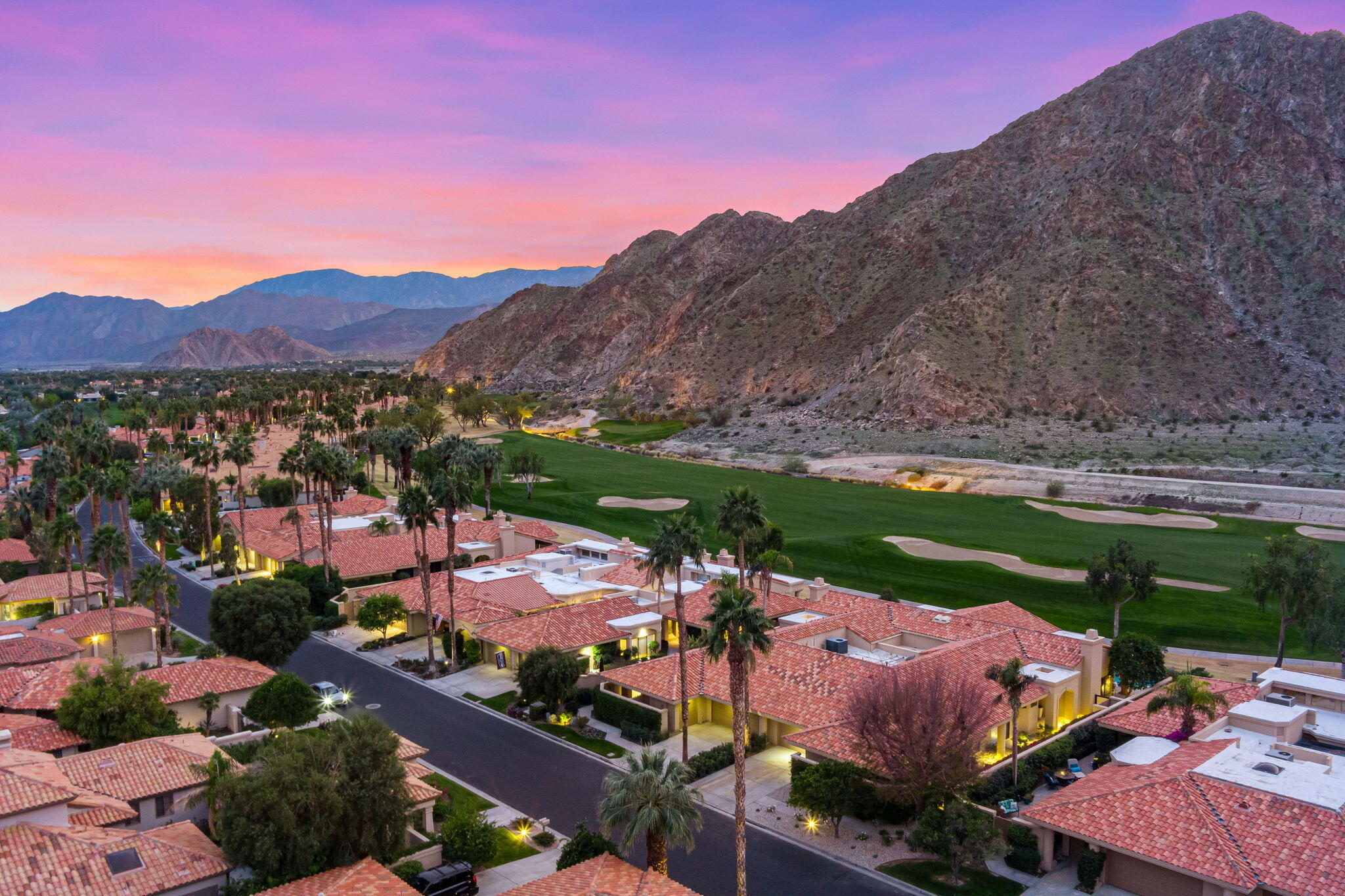 a view of a city with mountains