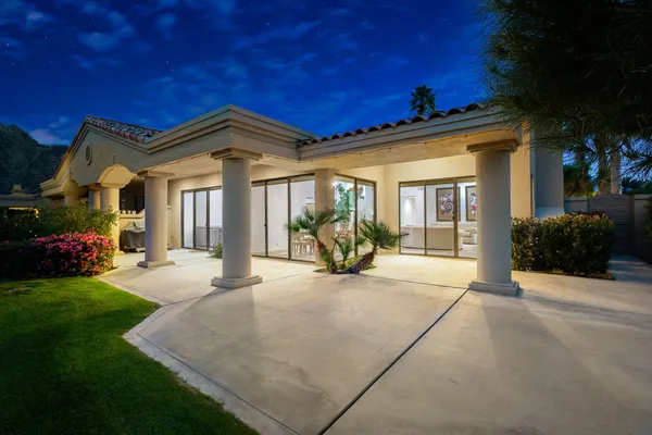 a view of a house with patio