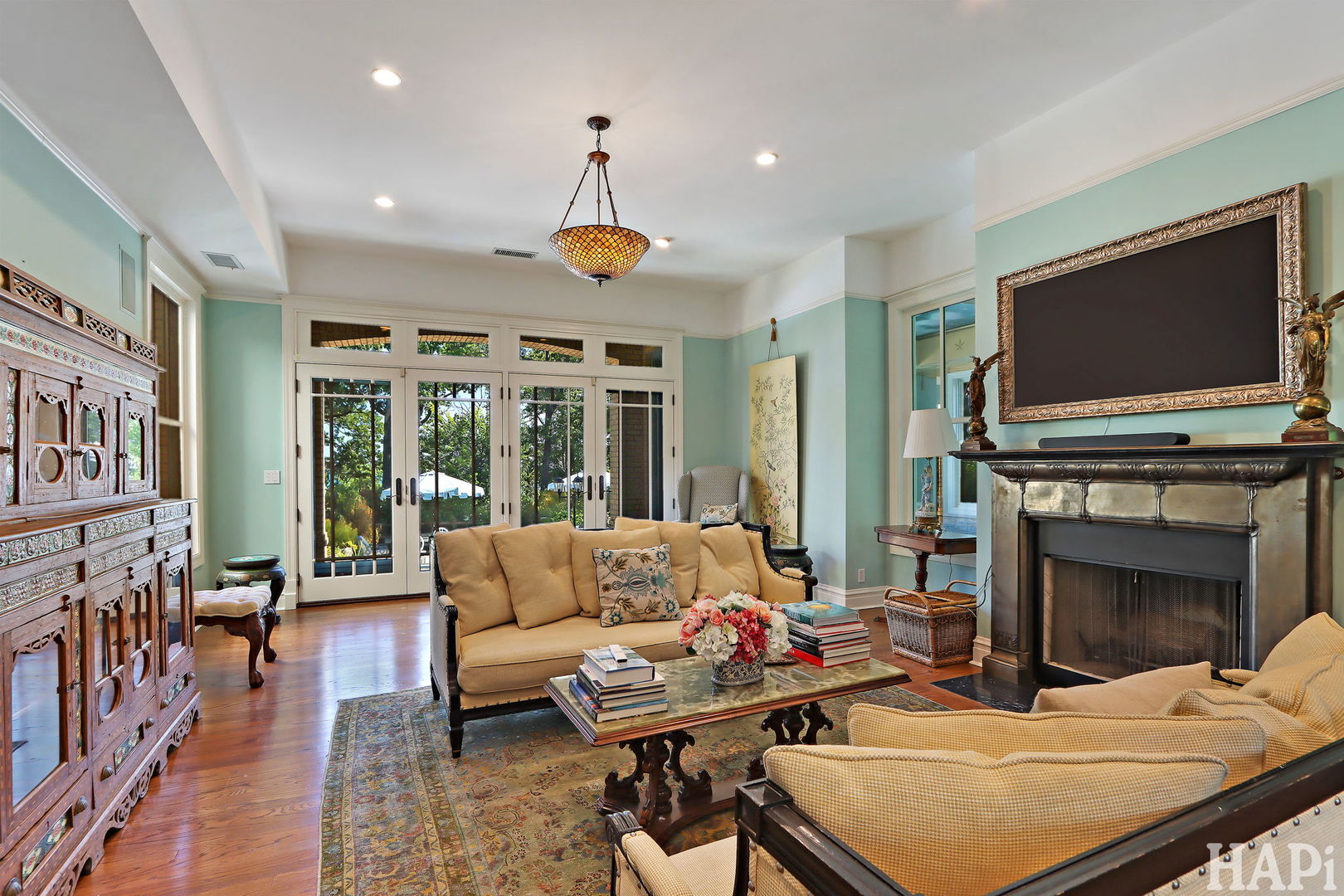 34 Logan Loop Highland Park, IL 60035 - Photo 17 of 82 a living room with furniture a fireplace and a flat screen tv