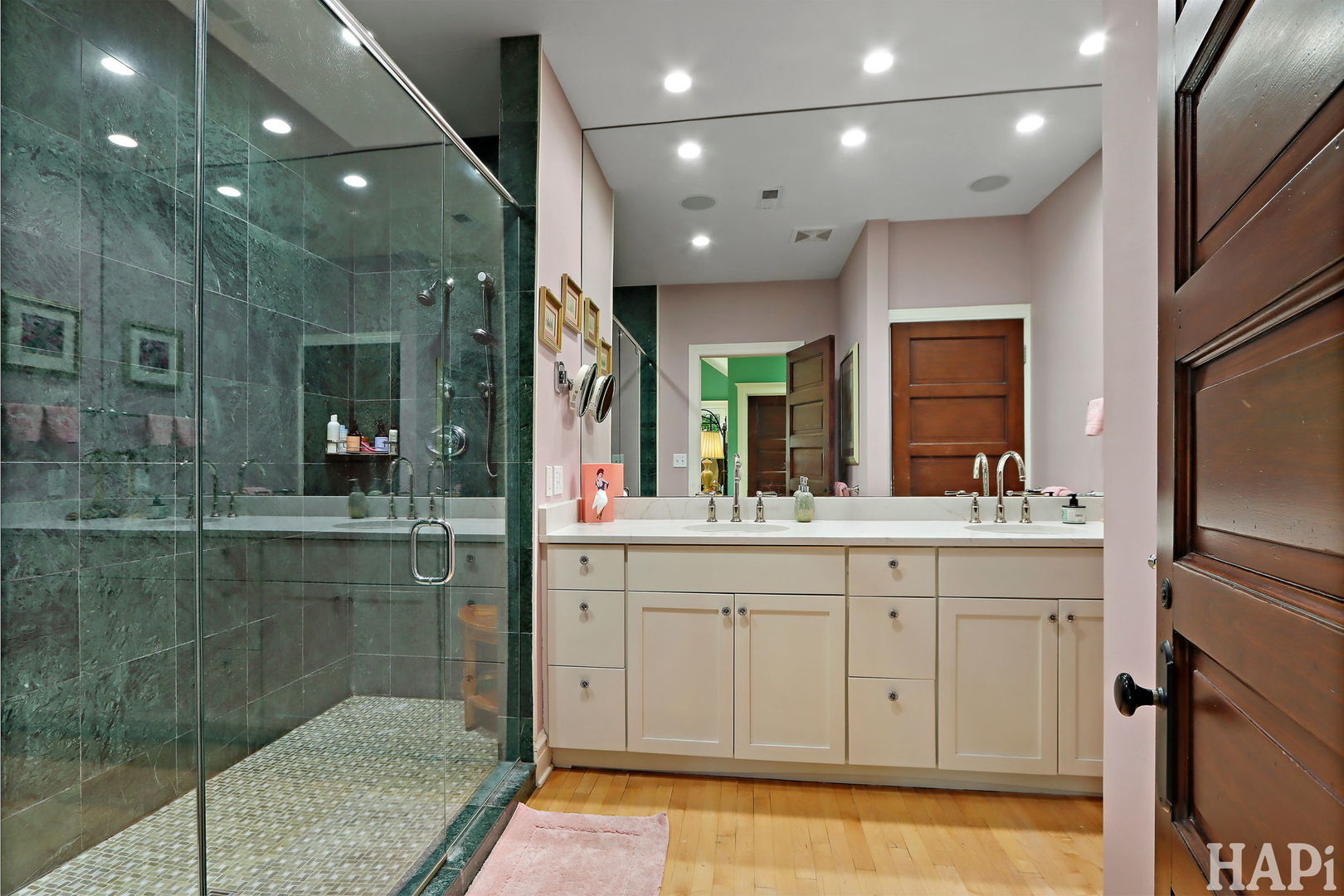 34 Logan Loop Highland Park, IL 60035 - Photo 32 of 82 a bathroom with a double vanity sink mirror and shower