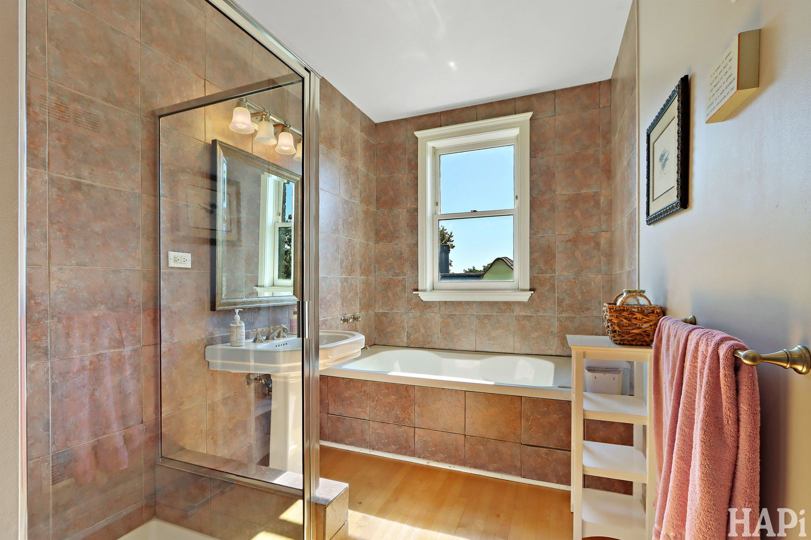 34 Logan Loop Highland Park, IL 60035 - Photo 33 of 82 a bathroom with a tub and a view of living room