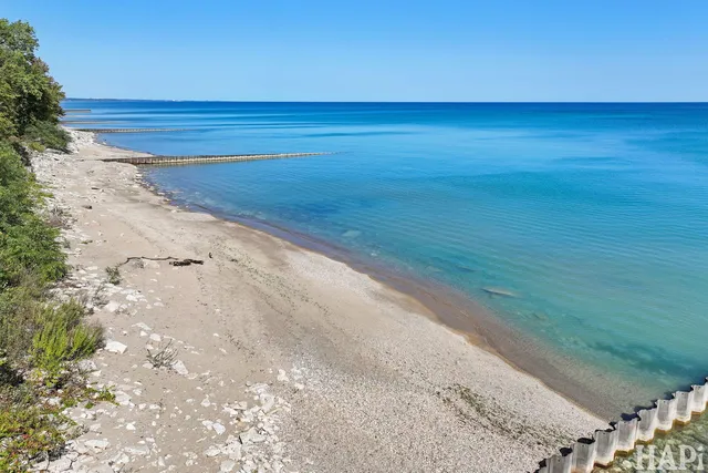 a picture of a bench in front of a building