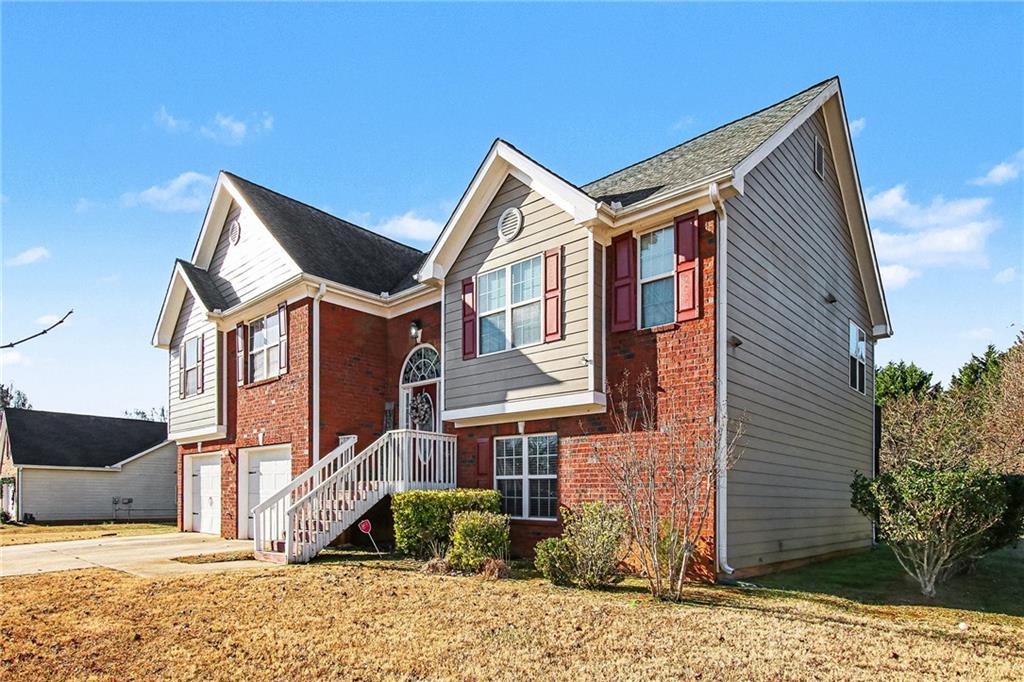 70 Feldspar Drive Jefferson, GA 30549 - Photo 2 of 22 a front view of a house with a yard