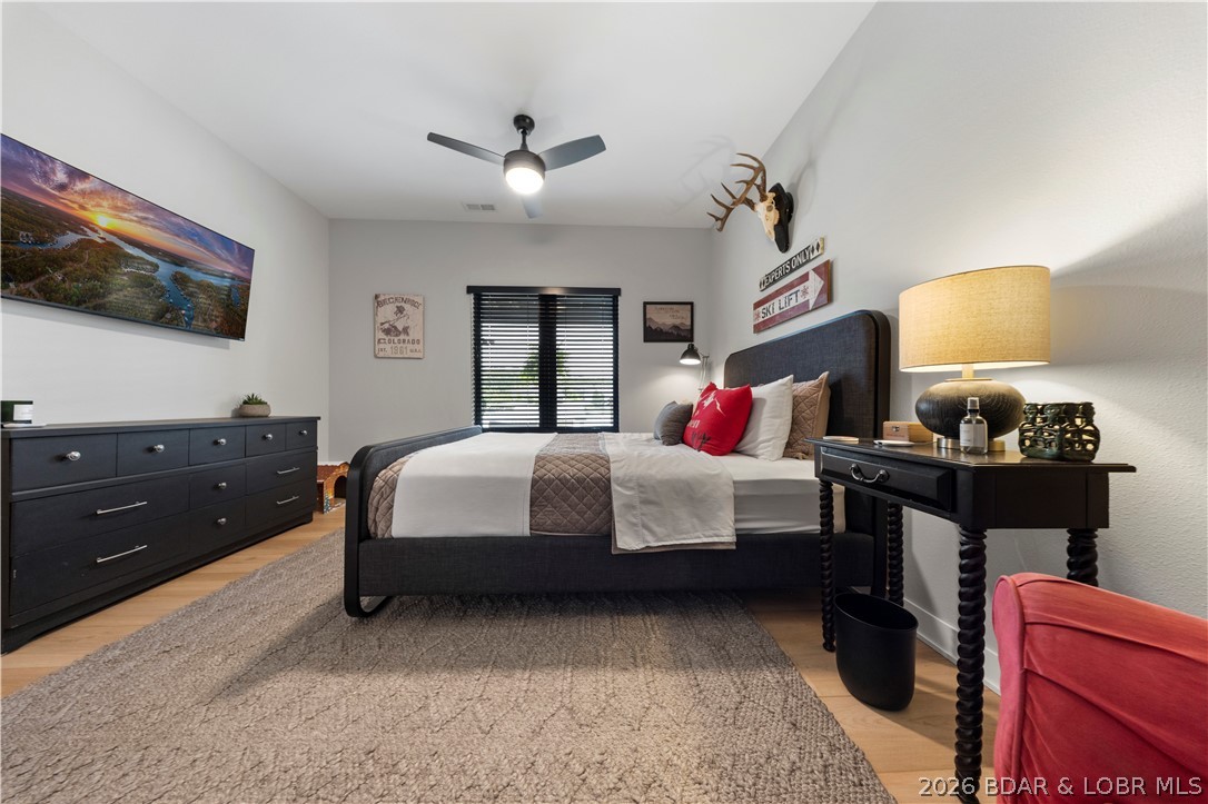 1151 Oak Road Osage Beach, MO 65065 - Photo 44 of 63 Spacious guest bedroom designed for comfort and re