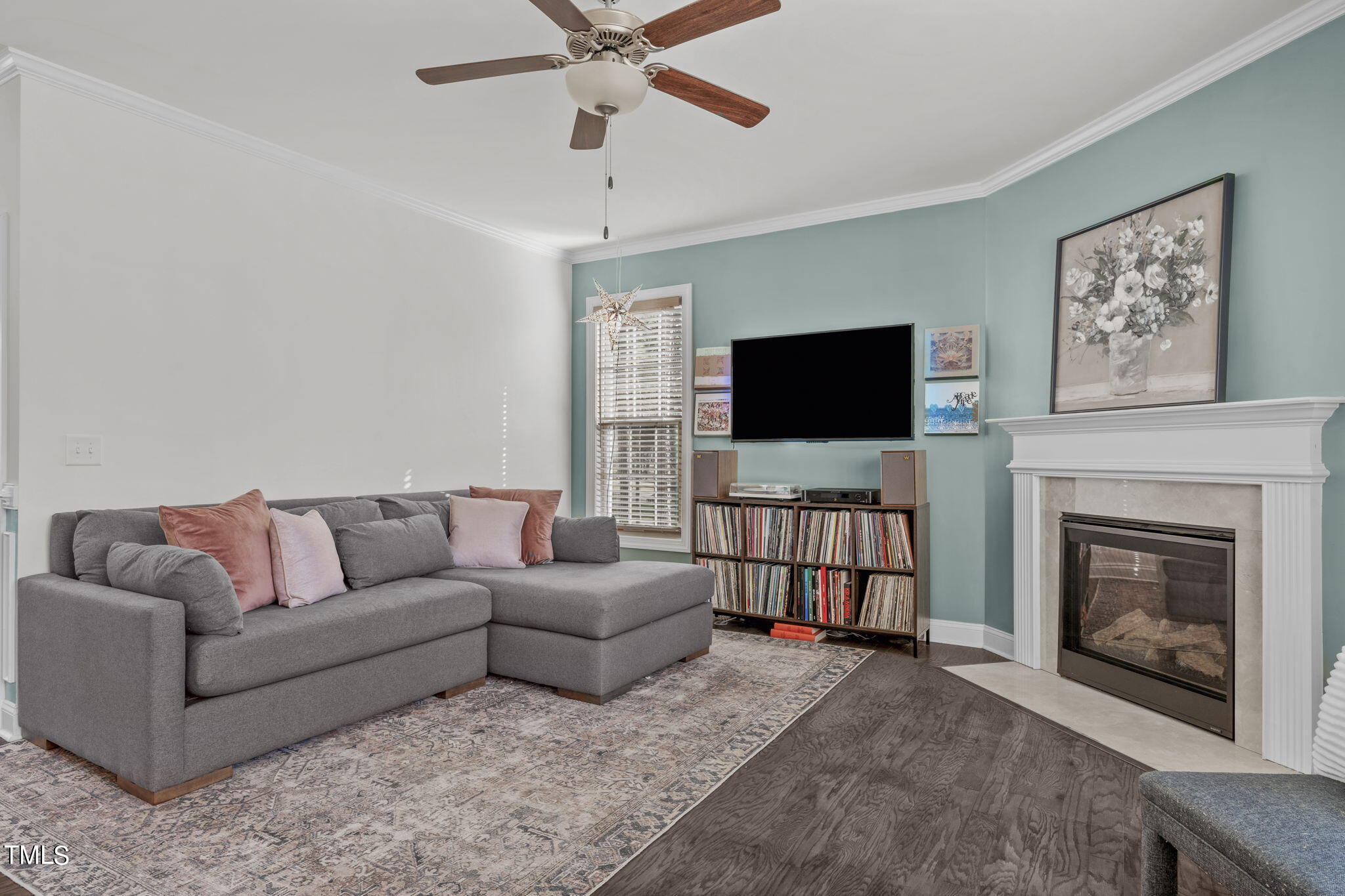 9716 Chris Drive Raleigh, NC 27603 - Photo 14 of 41 Or enjoy the fireplace