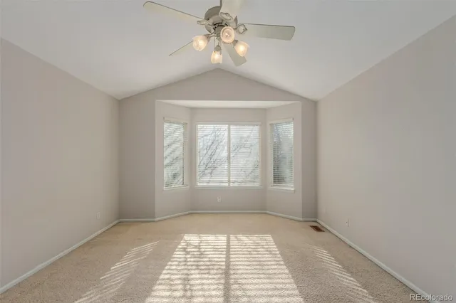 a view of an empty room and window