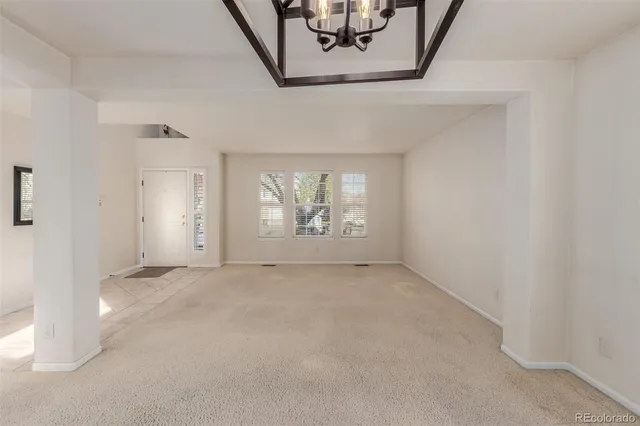 an empty room with windows