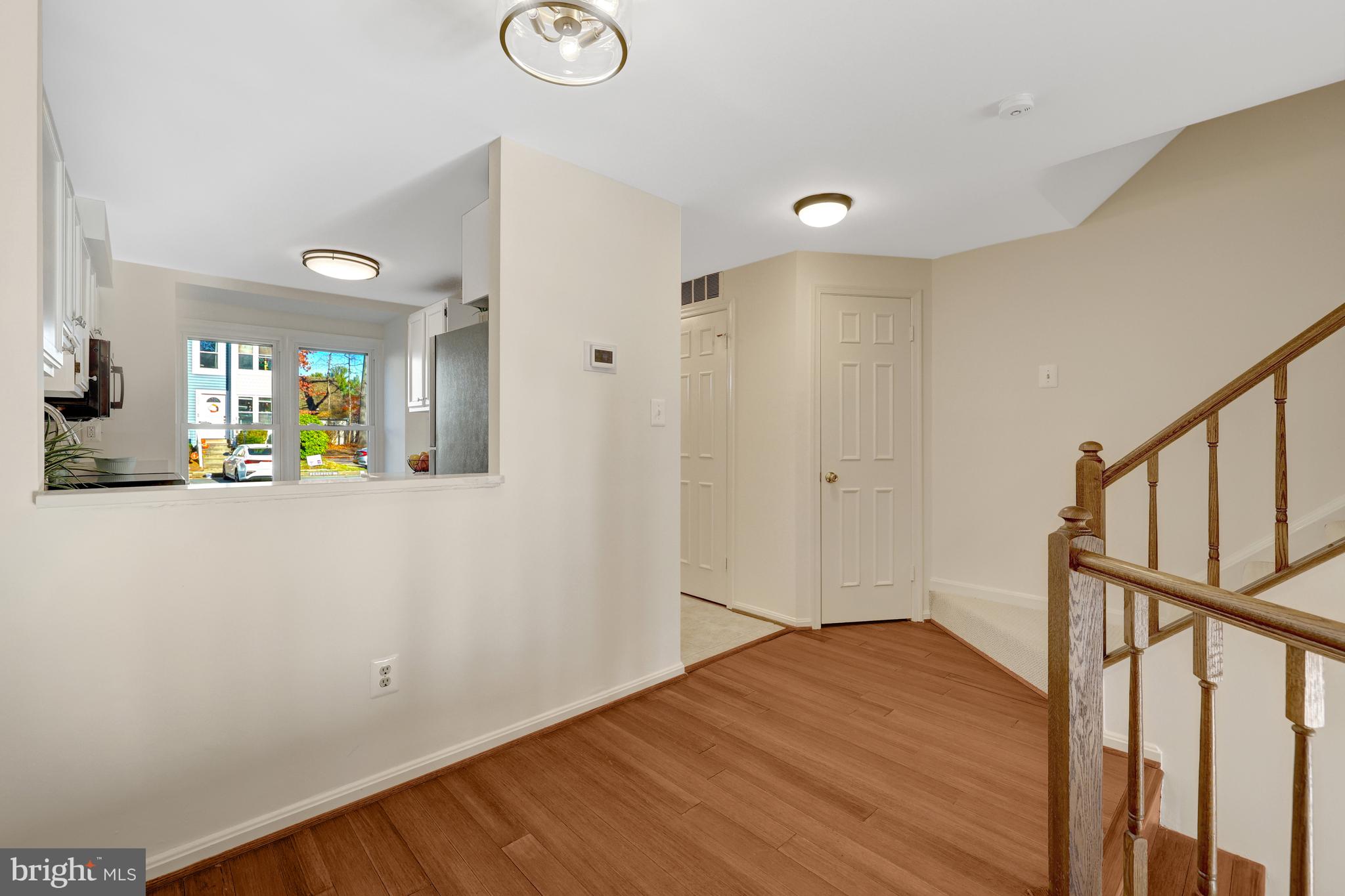 11200 Silentwood Lane Reston, VA 20191 - Photo 14 of 46 a view of an entryway with wooden floor