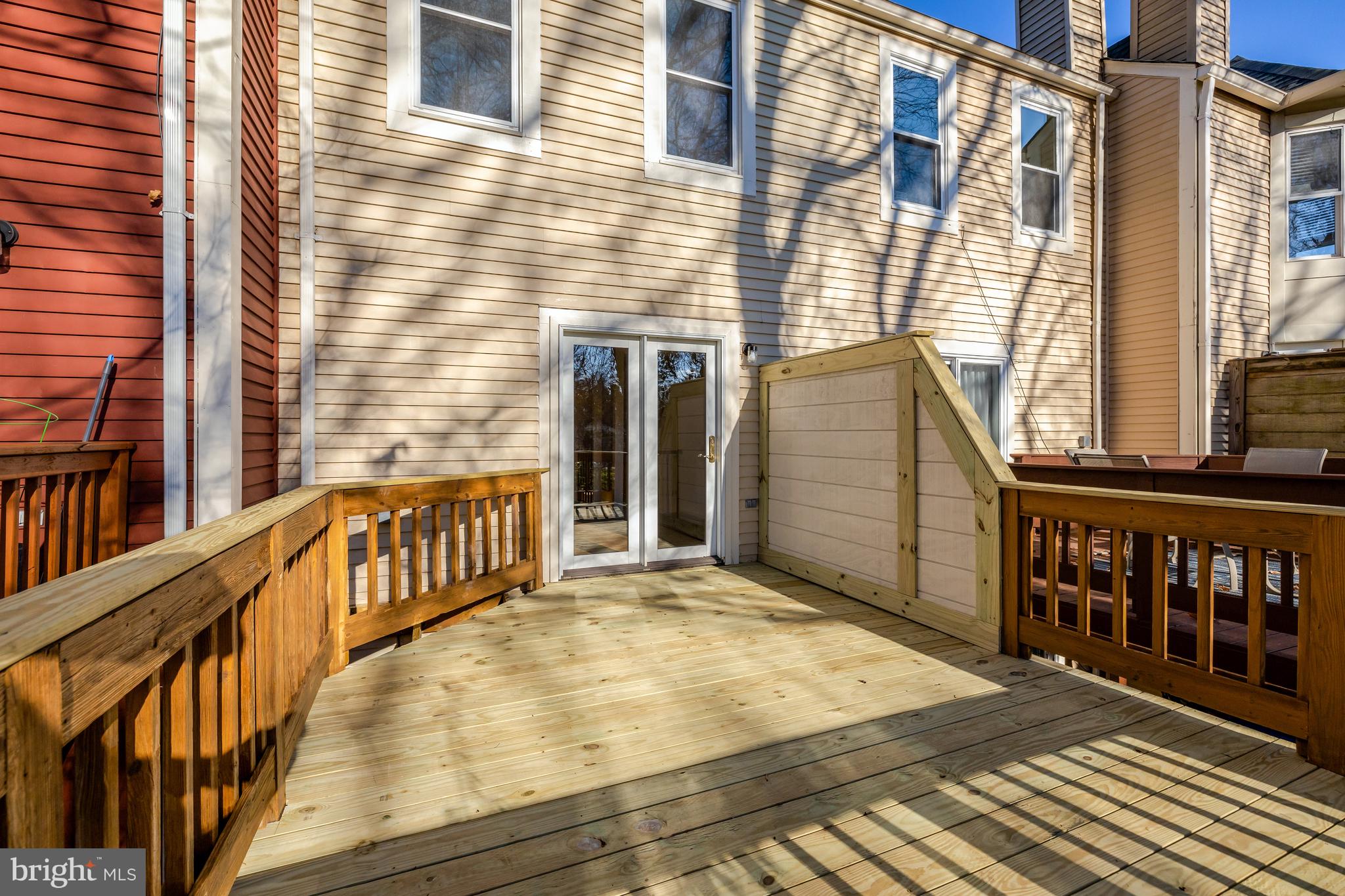 11200 Silentwood Lane Reston, VA 20191 - Photo 22 of 46 a view of a balcony with wooden floor