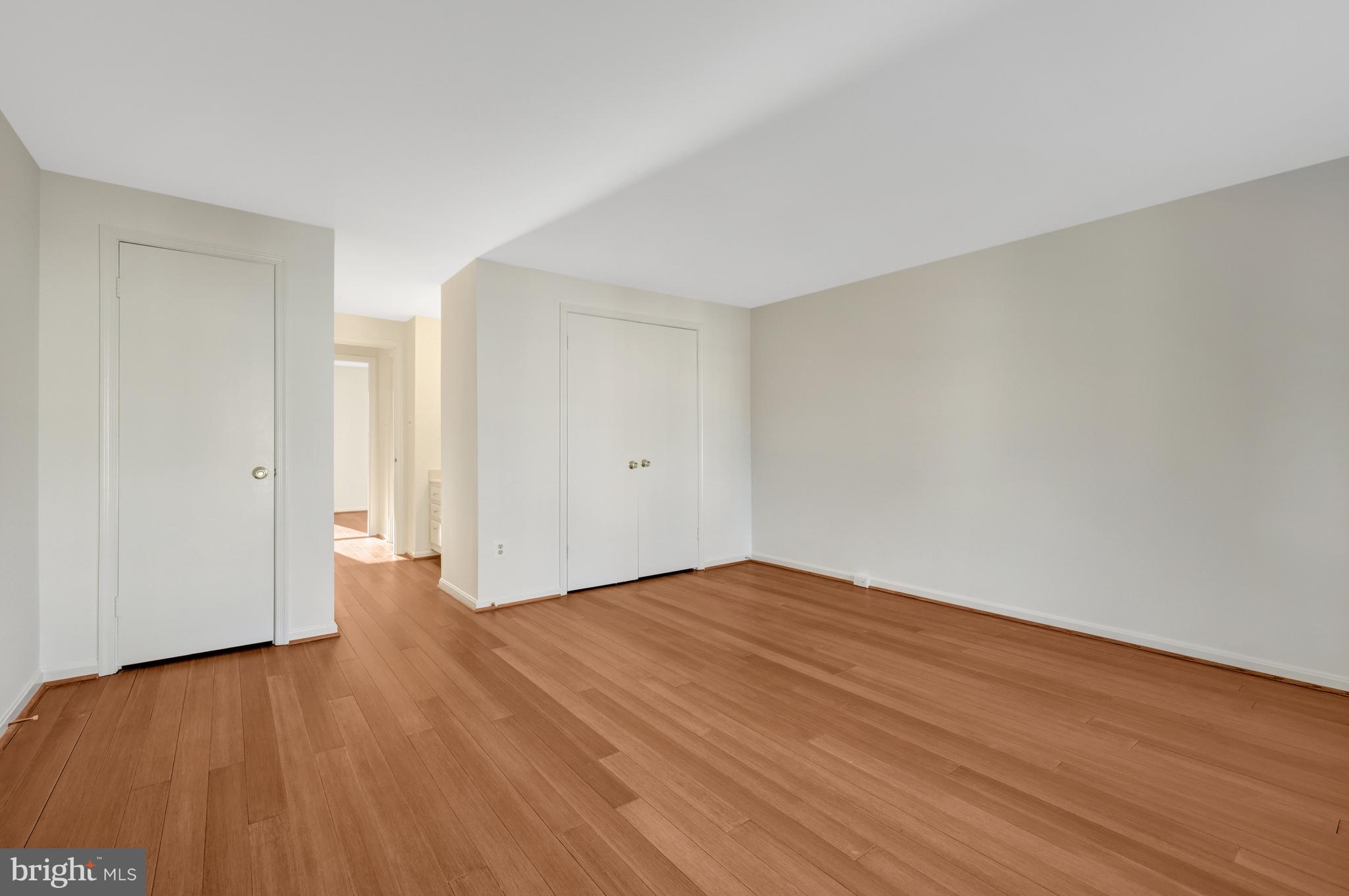 11200 Silentwood Lane Reston, VA 20191 - Photo 28 of 46 a view of an empty room with wooden floor