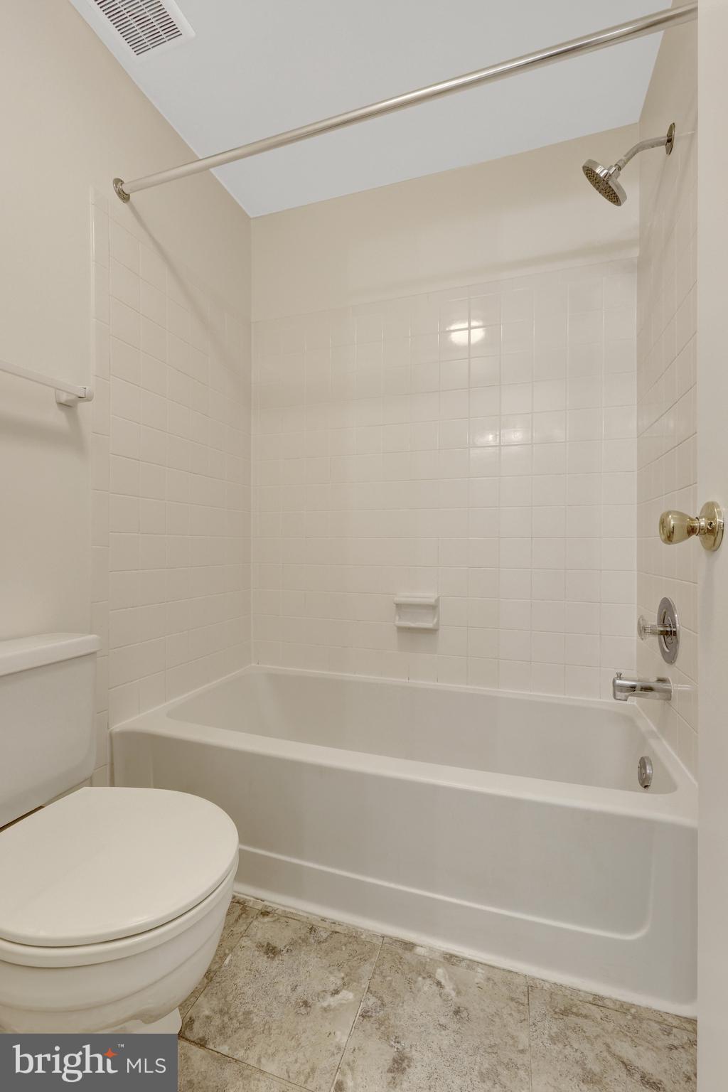 11200 Silentwood Lane Reston, VA 20191 - Photo 33 of 46 a bathroom with a toilet and a shower