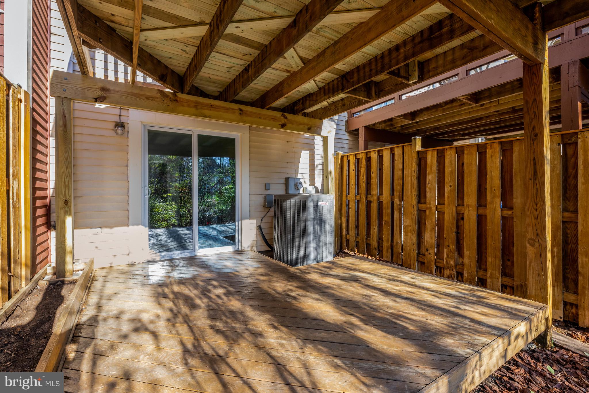 11200 Silentwood Lane Reston, VA 20191 - Photo 42 of 46 a view of a porch with wooden floor and fence