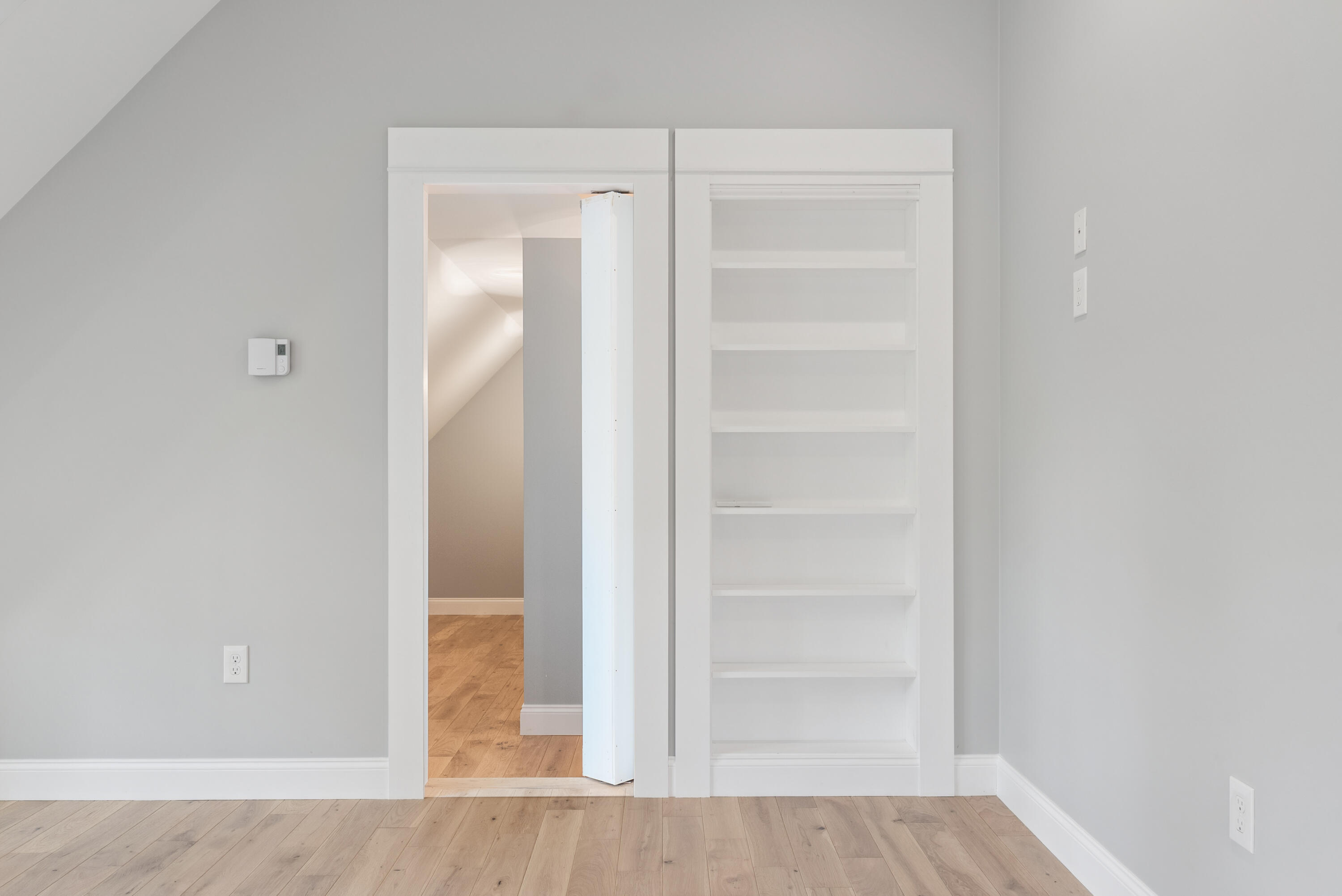 28 Riverlocks Road Kennebunk, ME 04043 - Photo 41 of 86 Primary Bedroom Hidden Closet