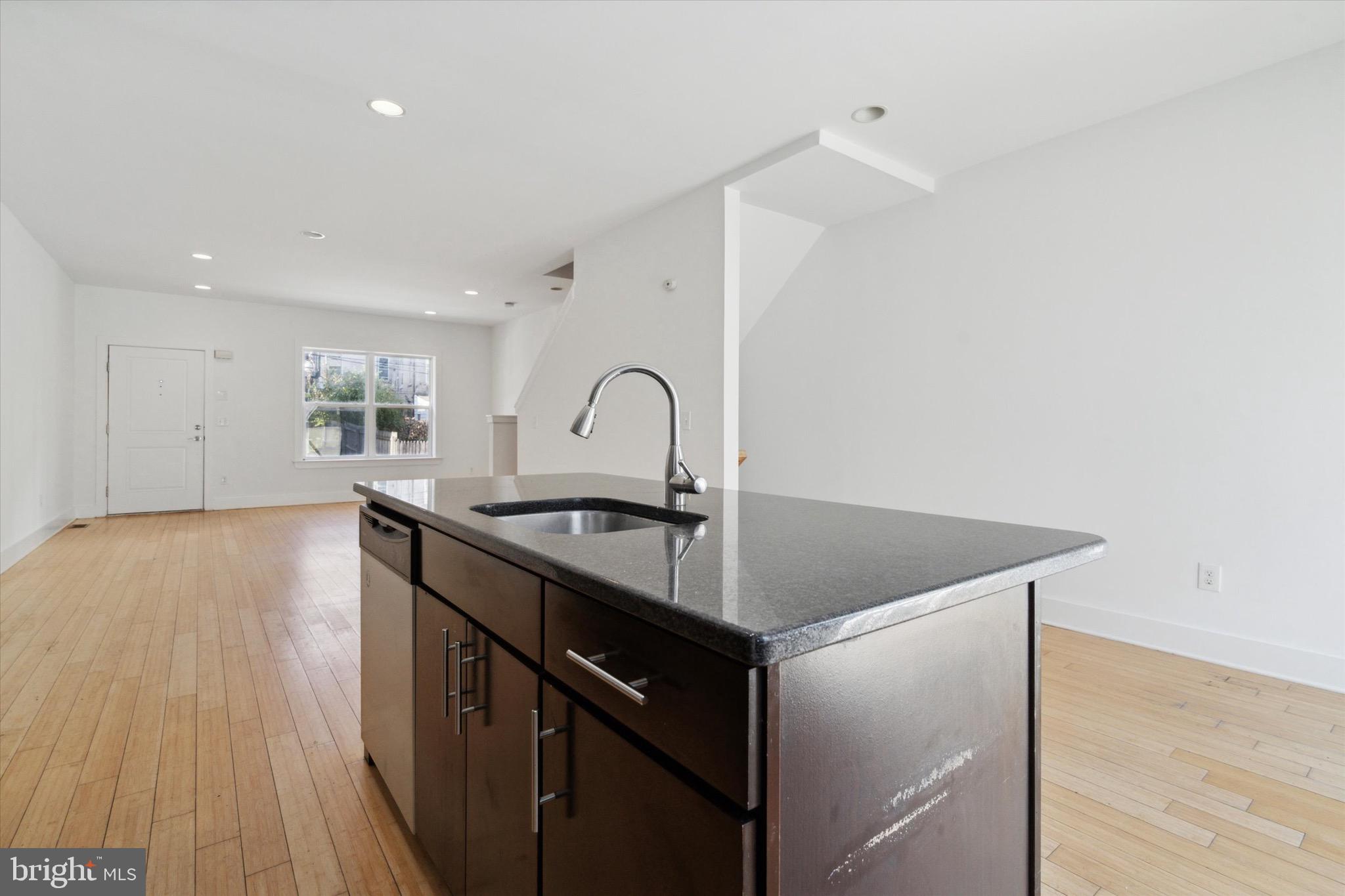 1345 Palethorp Street Philadelphia, PA 19122 - Photo 6 of 15 a view of a kitchen with a sink and cabinets