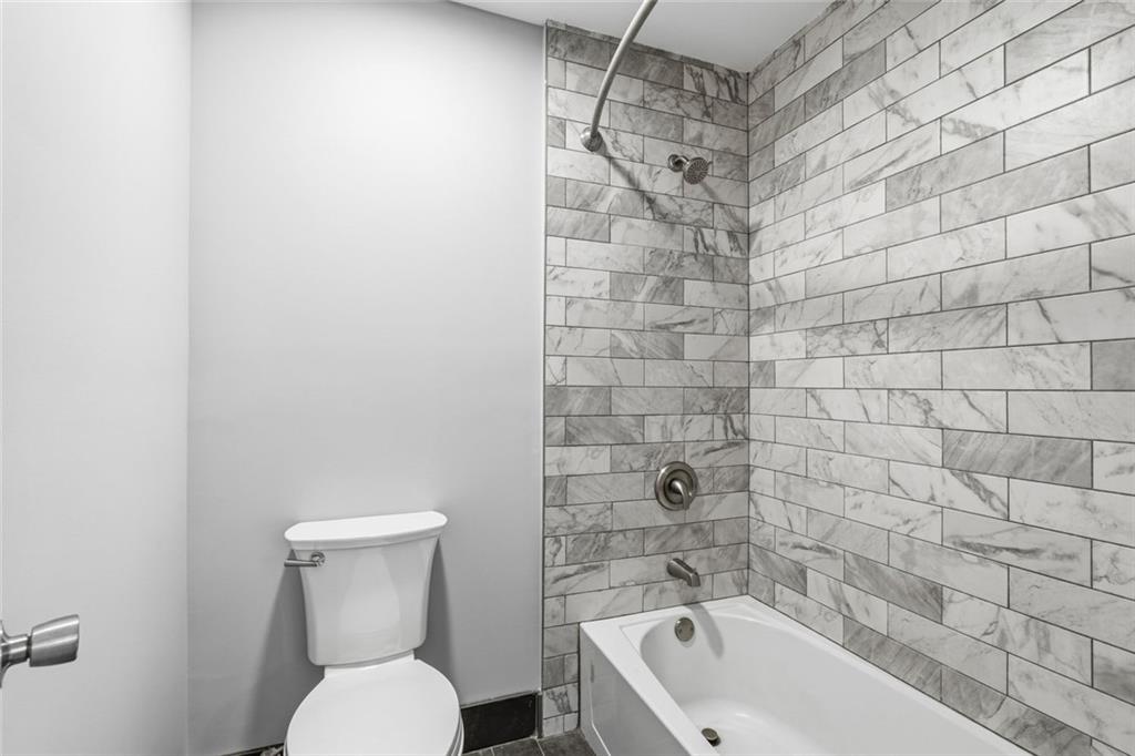 210 Appleby Drive, Unit 119 Athens, GA 30605 - Photo 22 of 35 a bathroom with a toilet and shower
