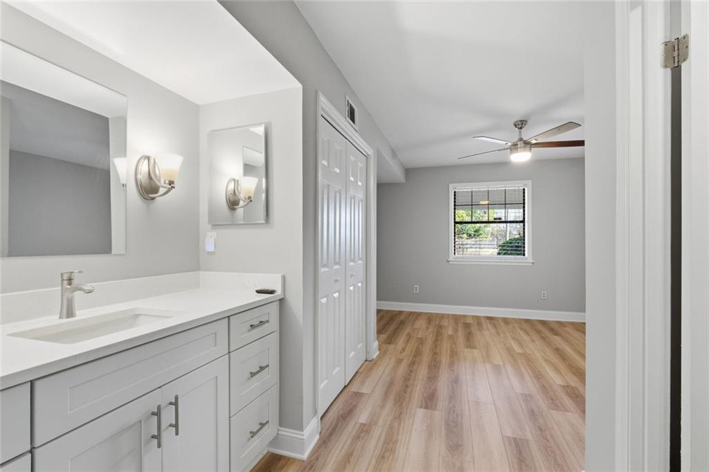 210 Appleby Drive, Unit 119 Athens, GA 30605 - Photo 24 of 35 a spacious bathroom with a sink and a mirror