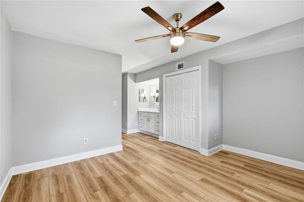 210 Appleby Drive, Unit 119 Athens, GA 30605 - Photo 26 of 35 wooden floor in an empty room