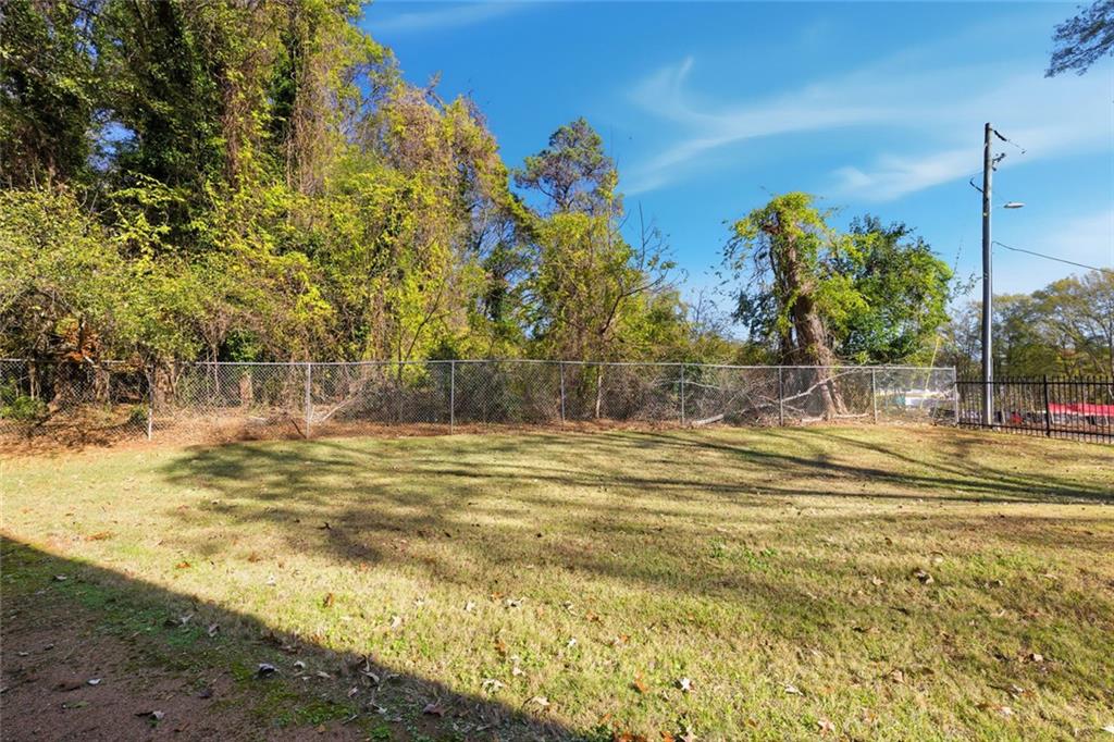 210 Appleby Drive, Unit 119 Athens, GA 30605 - Photo 30 of 35 a view of a swimming pool with an outdoor space and seating area