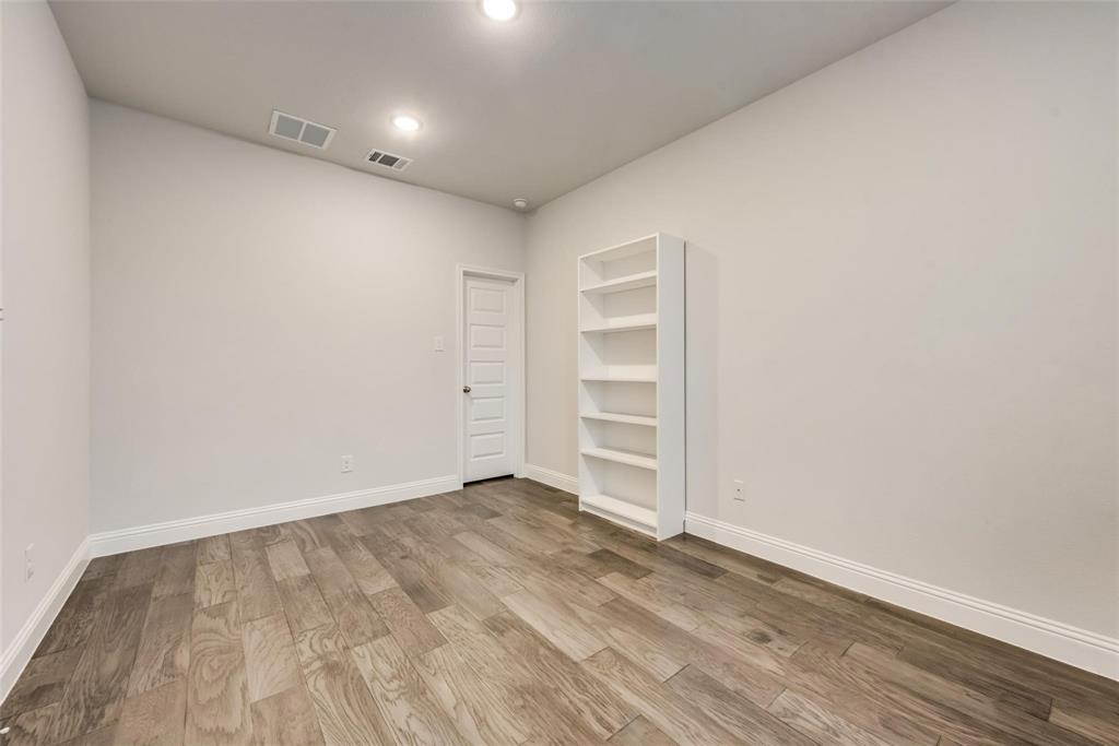 14623 Prairie Fire Drive Frisco, TX 75033 - Photo 6 of 36 wooden floor in an empty room
