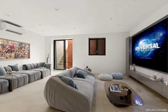 a view of a balcony with furniture