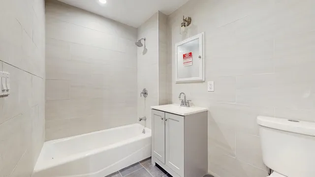 a view of room with wooden floor and window