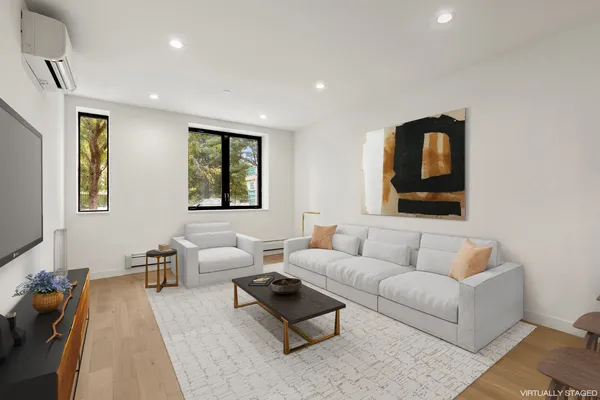a picture of a room with a white wall and a picture of the wall