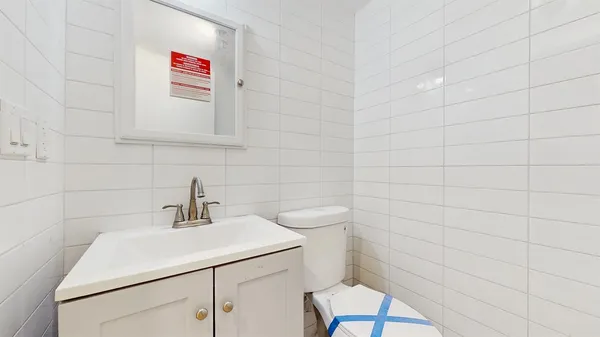 a bathroom with a sink and a toilet