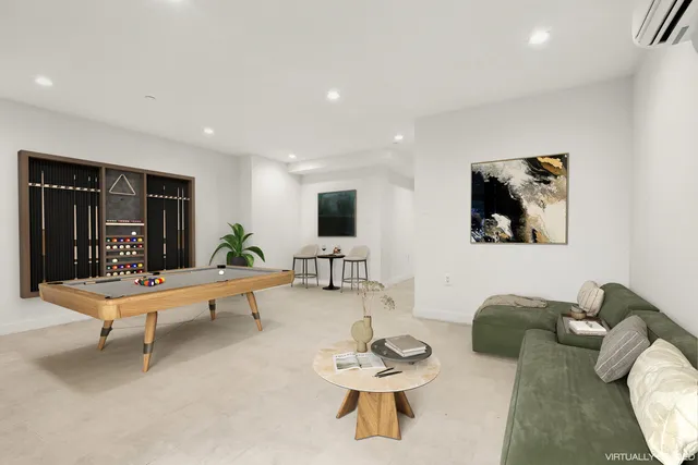 a kitchen with granite countertop a refrigerator stove top oven and sink