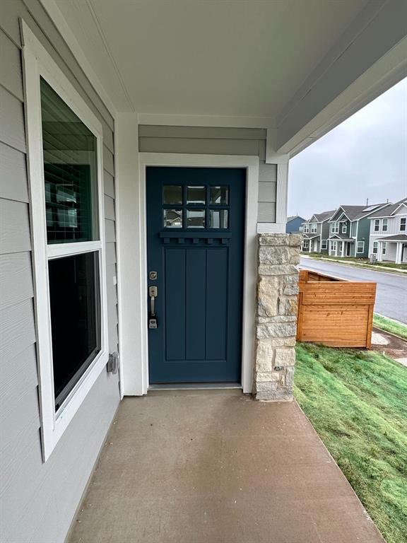 346 Carmello Kyle, TX 78640 - Photo 4 of 39 Property entrance with a residential view