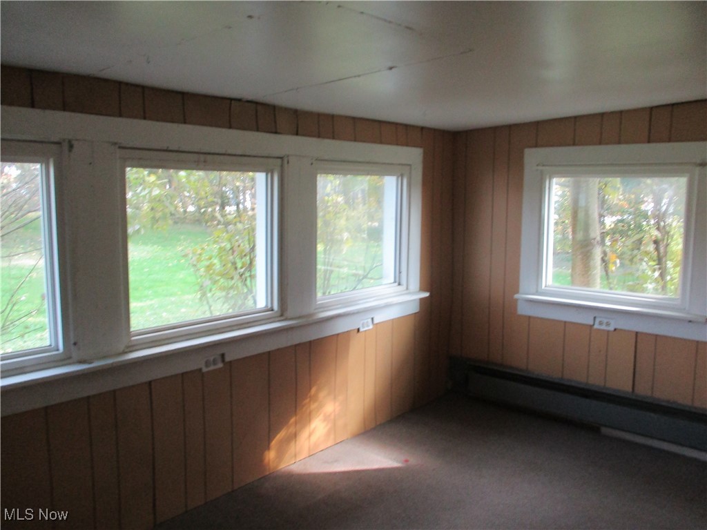 15401 A Madison Road Middlefield, OH 44062 - Photo 5 of 17 3 season room due to light insulation