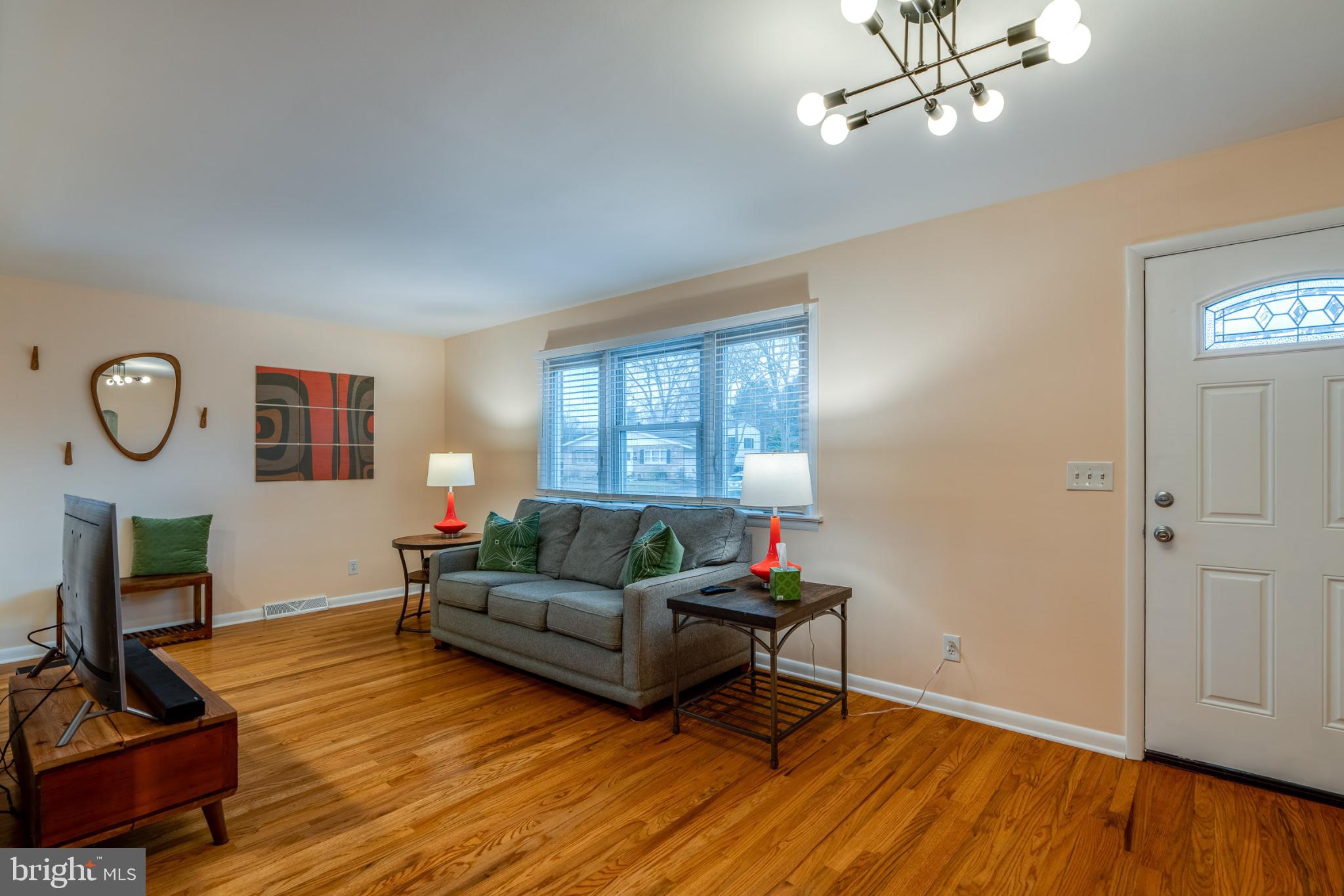 534 West Marion Street Lititz, PA 17543 - Photo 7 of 43 a living room with furniture a window and a fireplace